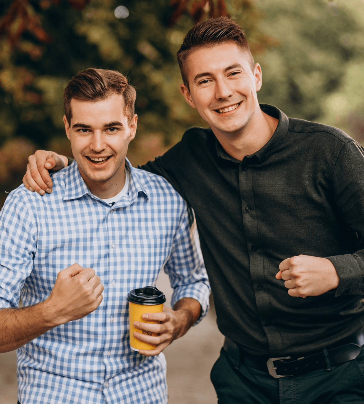 a couple of men standing next to each other